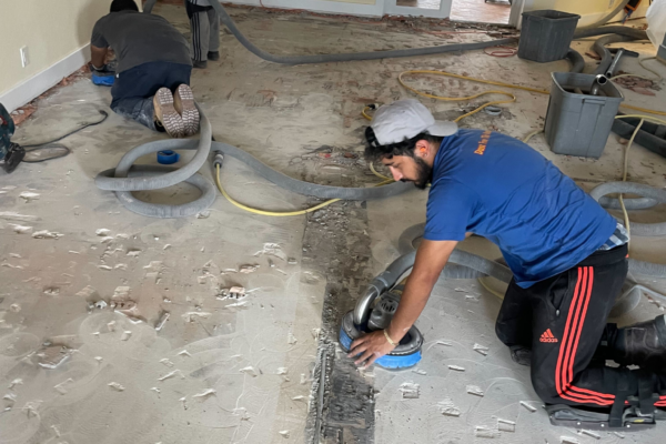 contractor removing tile floor